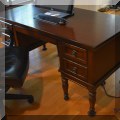 F32. Signature Design for Ashley Furniture executive desk. 30"h x 60"w x 30"d 